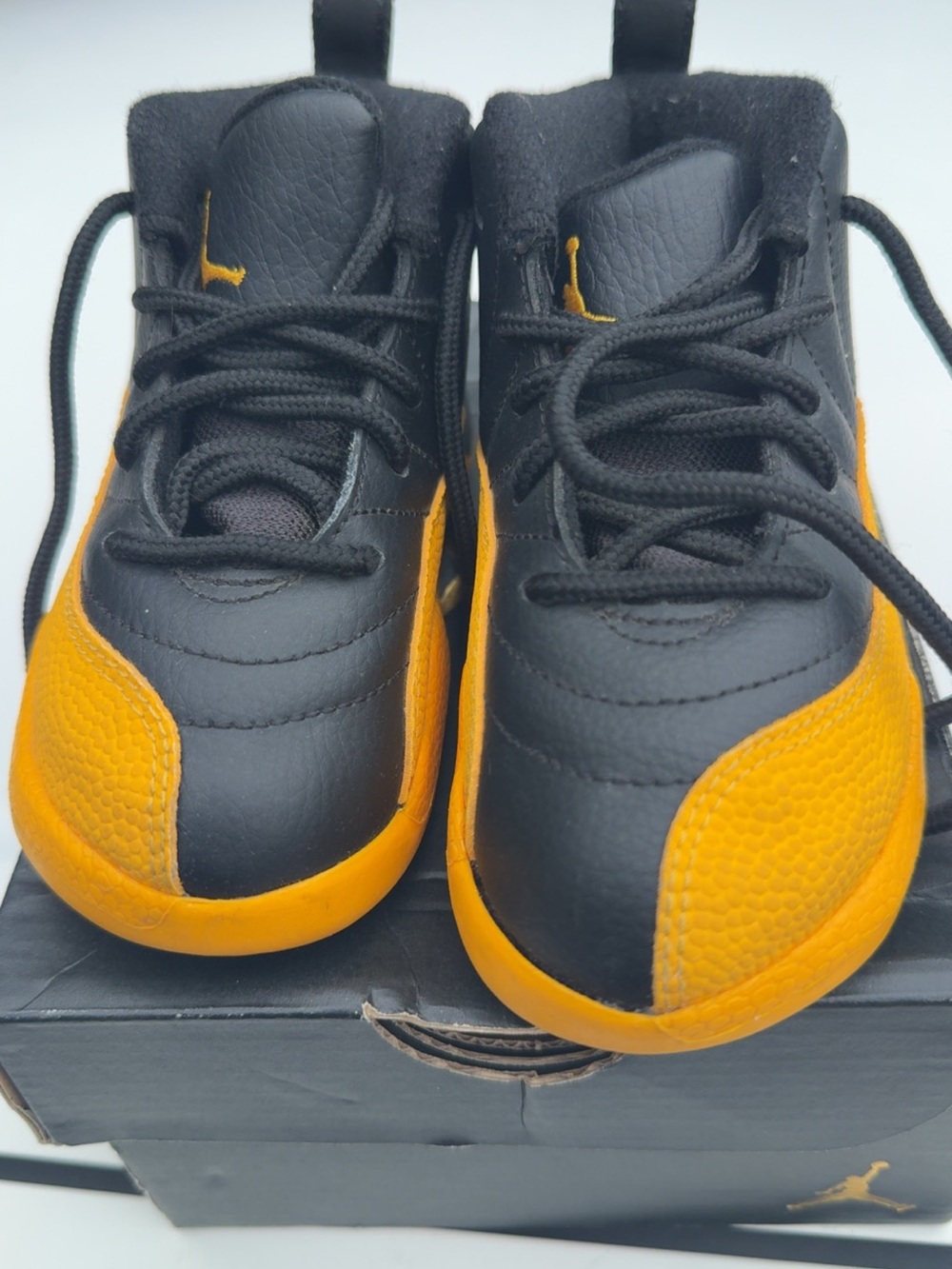 Jordan Kids Black and Gold Low-Top Sneakers